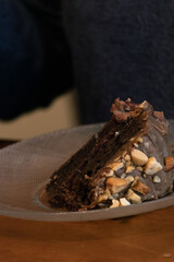 Elderly woman preparing baked and enjoying goods