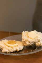 Elderly woman preparing baked and enjoying goods