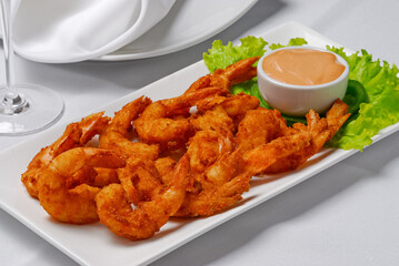 Crispy shrimp in white bowl. Brazilian gastronomy.