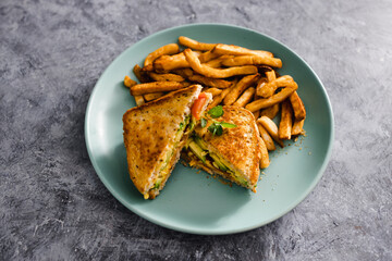 plant-based food,  vegan avocado tomato and dairy-free cheese sandwiches with french fries