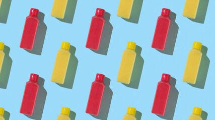 Seamless pattern of red and yellow plastic bottles.