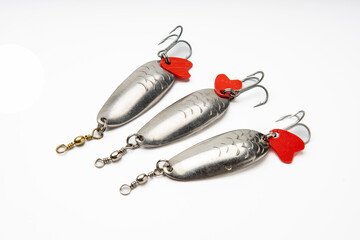 Artificial baits for catching of the predatory fishes on white background