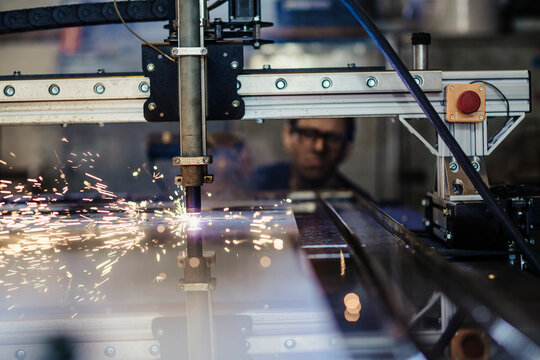 Plasma cutter machine cutting metal sheets