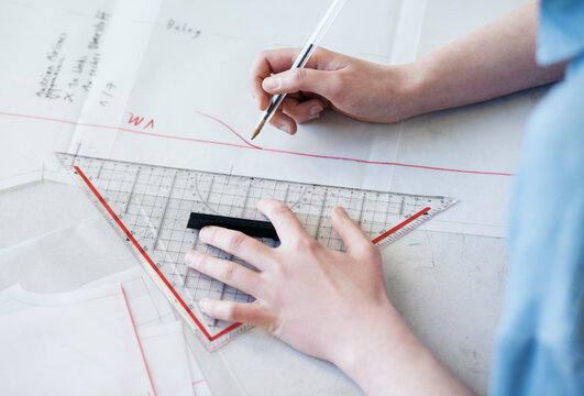 Fashion designer's hands.