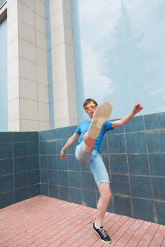 young man kicking