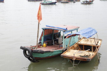 Fototapeta na wymiar Floating Fishing Village In The Ha Long Bay. Cat Ba Island, Vietnam Asia. Cat Ba, Vietnam - March 5, 2020