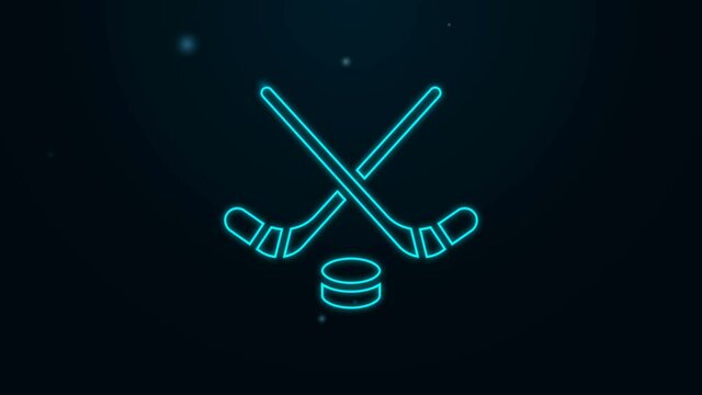 Glowing neon line Ice hockey sticks and puck icon isolated on black background. Game start. 4K Video motion graphic animation
