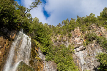 Fototapeta na wymiar Beautiful waterfall located in Saint-Alexandre-des-lacs, Canada
