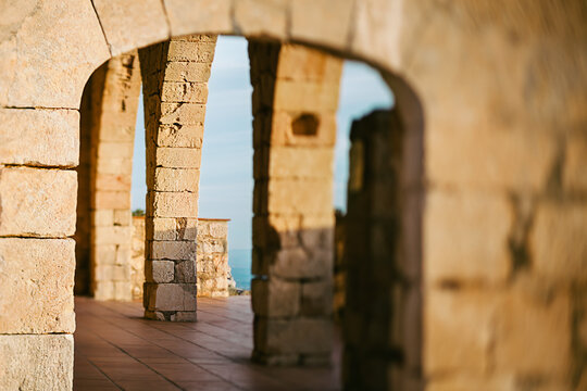 Old architecture view through a stone door