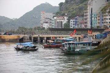 Floating Fishing Village In The Ha Long Bay. Cat Ba Island, Vietnam Asia. Cat Ba, Vietnam - March...