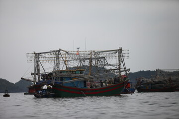Naklejka na ściany i meble Floating Fishing Village In The Ha Long Bay. Cat Ba Island, Vietnam Asia. Cat Ba, Vietnam - March 5, 2020