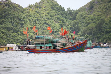Floating Fishing Village In The Ha Long Bay. Cat Ba Island, Vietnam Asia. Cat Ba, Vietnam - March 5, 2020 © binhdd