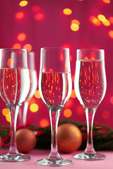 Close up photo of Champagne glasses against bokeh background