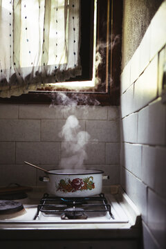 Copper pots on old stove