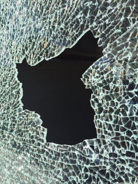 Detail of broken and shattered car window