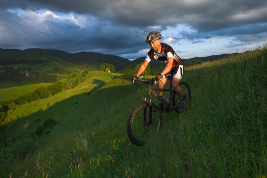 Man downhill mountain biking