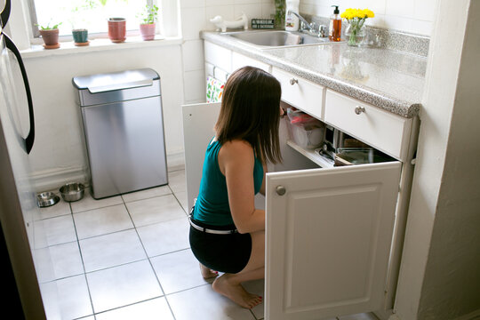 Woman cooking in kitchen