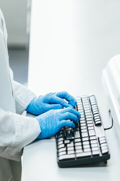 Doctor Typing on the Keyboard