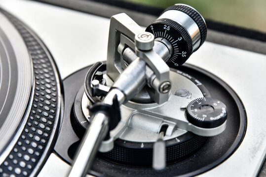 Detail of an old player and vinyl phonograph record