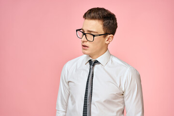 Business man in white shirt with tie wearing glasses self-confidence official pink background