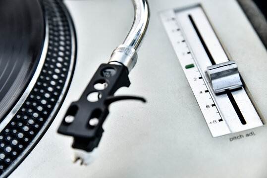 Detail of an old player and vinyl phonograph record