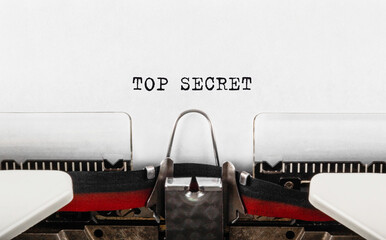 Text Top Secret typed on typewriter