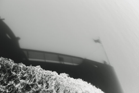 shadow of ship's bow in water