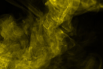 Yellow steam on a black background.