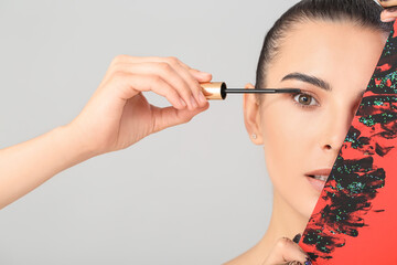 Beautiful young woman and poster with mascara strokes against light background