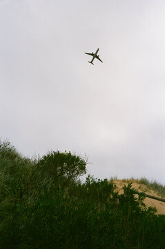 A plane takes off over Wanda Sand Dunes