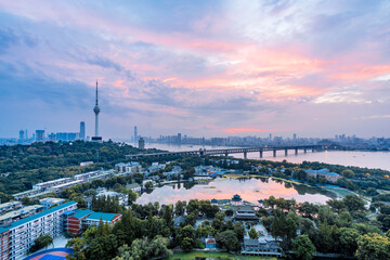 Early morning colorful clouds at Guishan TV Tower and Yangtze River Bridge in Wuhan, Hubei, China