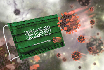 Face mask with flag of Saudi Arabia, defending coronavirus - 379806535