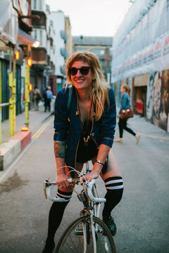 Attractive woman riding a bicycle in london