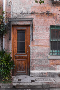 Cute cottage with narrow timber door