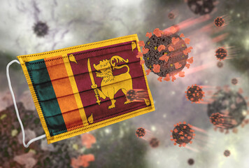 Face mask with flag of Sri Lanka, defending coronavirus - 379807358