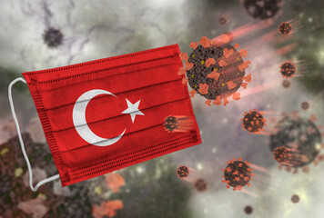Face mask with flag of Turkey, defending coronavirus - 379807989