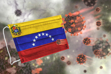 Face mask with flag of Venezuela, defending coronavirus - 379808545