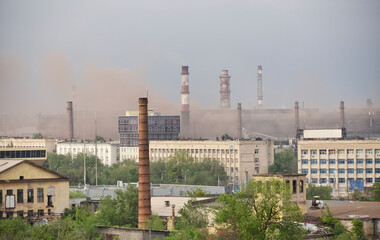 Fototapeta premium smog over the city, smoking pipes