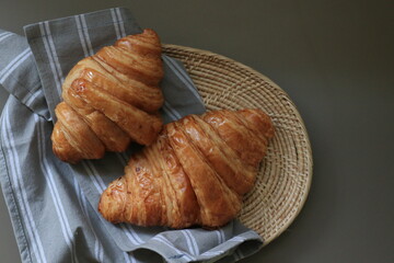 Croissants , French Pastry , on Grey Napkin in a basket