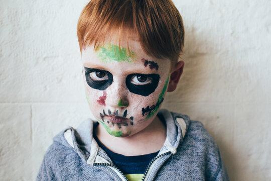 Child with face painted