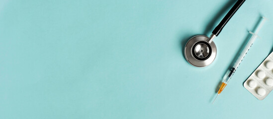 Medical background material and copy space. Stethoscope, syringe and medicine. 医療の背景素材とコピースペース。聴診器と注射器と薬	
