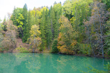 Blue mountain lake in autumn. Beautiful autumn morning