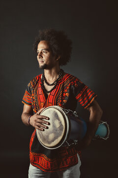 Cuban Musician Playing Bata Drums