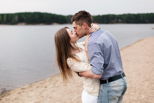 Young couple in love outdoor sensual photo