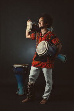 Cuban Musician Playing Bata Drums