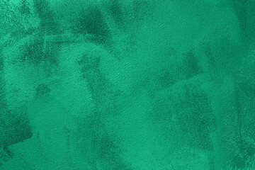 Trendy mint colored low contrast Concrete textured background with roughness and irregularities to...