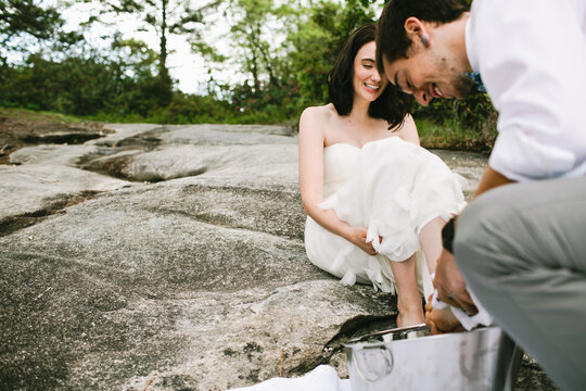 groom washing his bride's feet