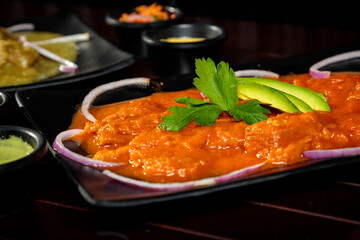 Mexican dish Chicharon in red sauce