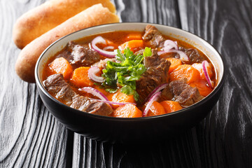 Bo kho is a delicious spicy beef stew dish, that is popular in Vietnam close-up in a bowl on the...