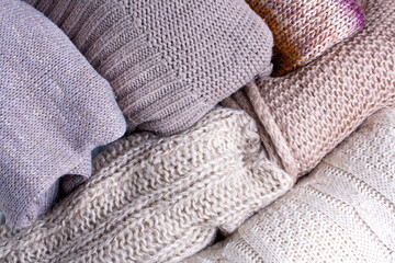 Fototapeta na wymiar Background texture of knitted sweaters. Winter autumn